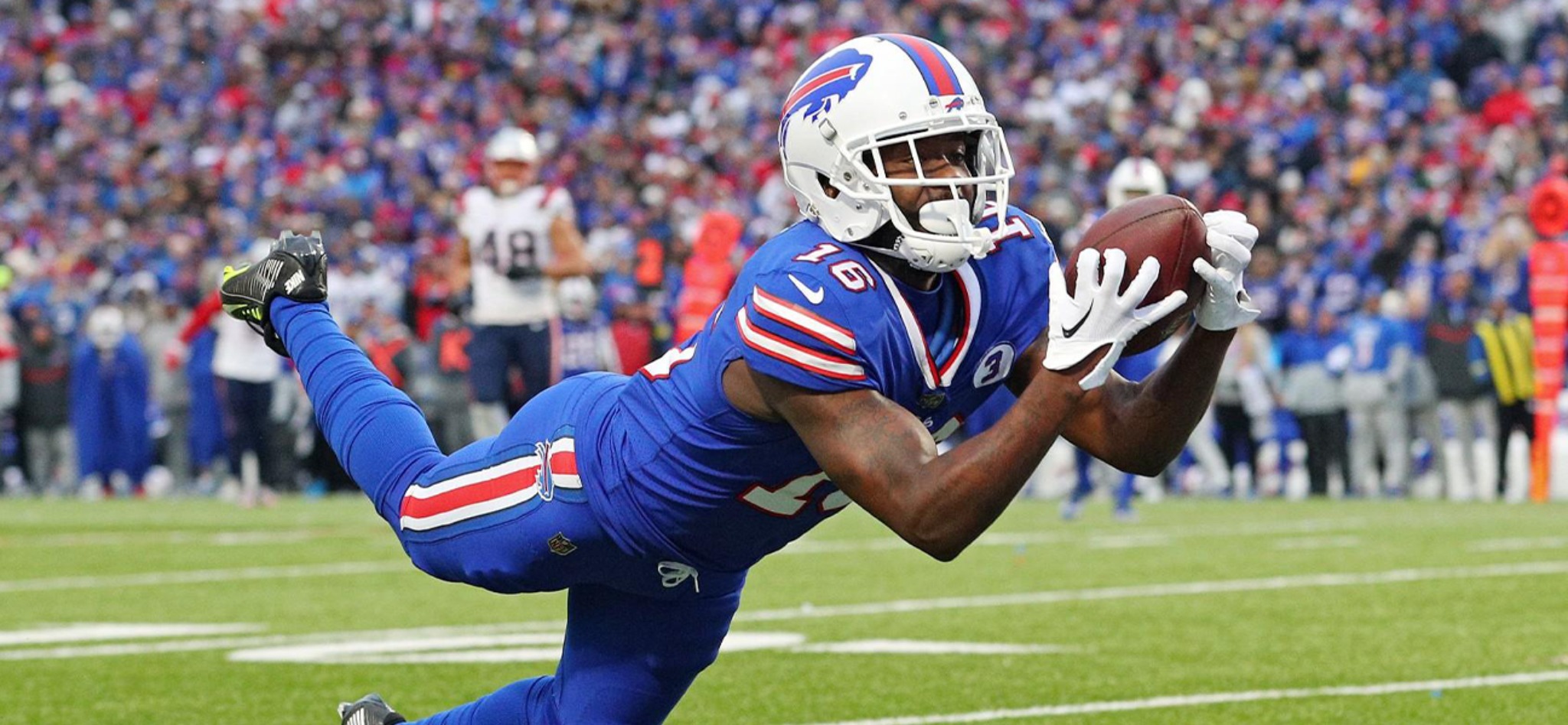 Player catching a football